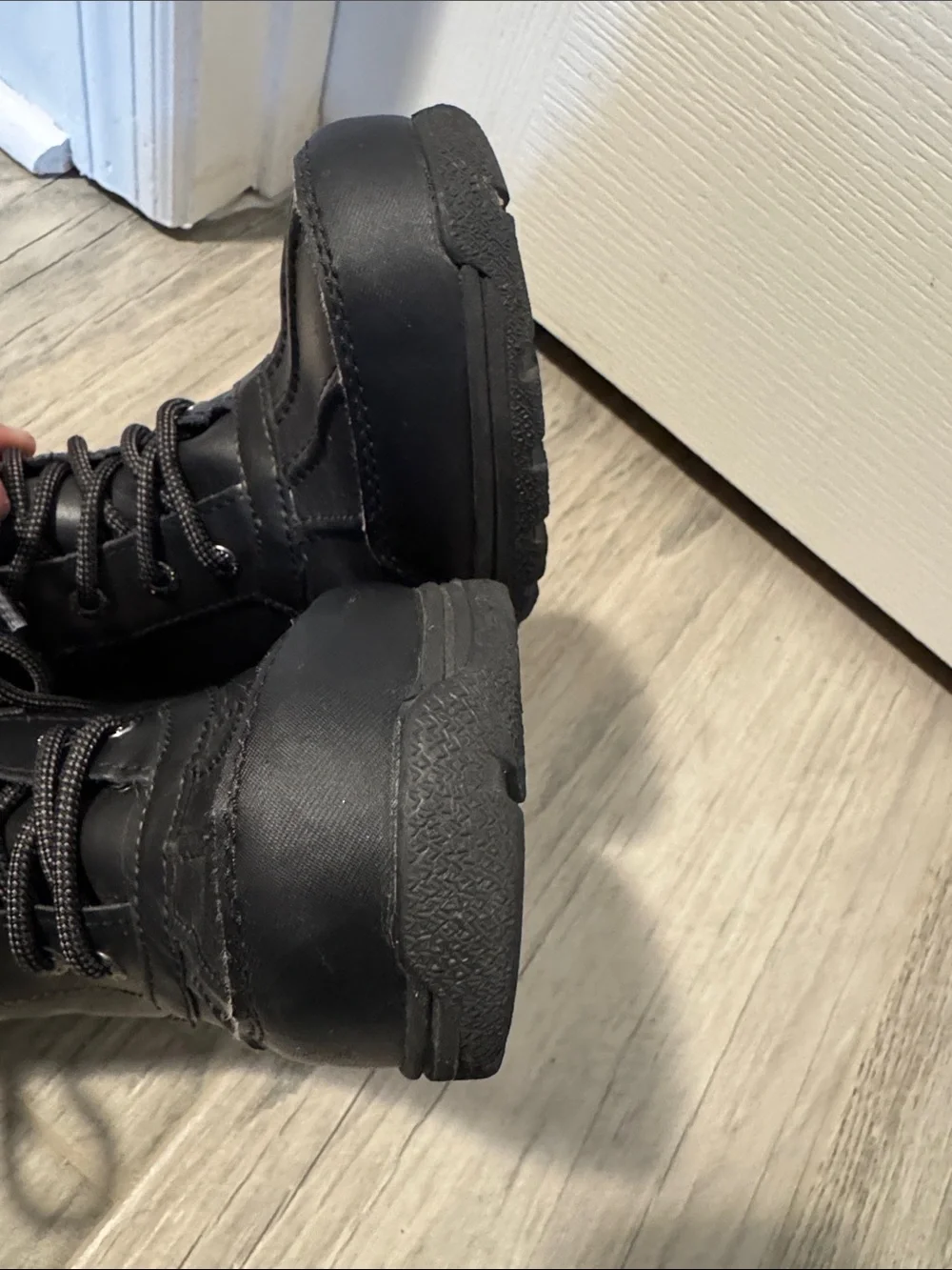 UGG Adirondack water proof insulated lace up winter boots.